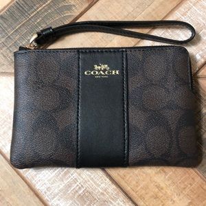 Coach black and brown wristlet…in pristine condition